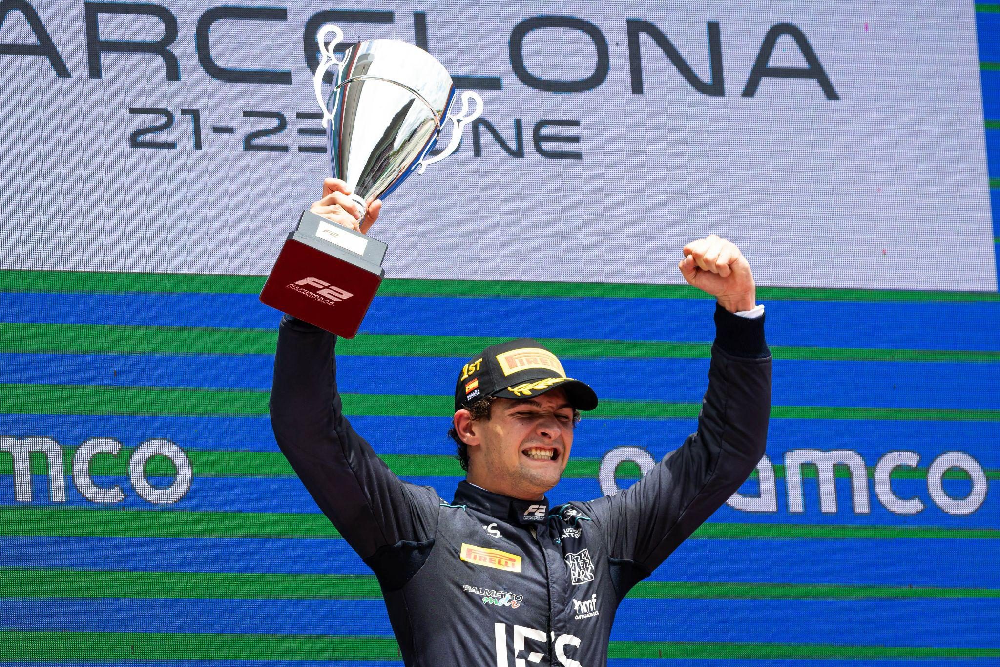 DAMS driver Jak Crawford celebrates his 2024 F2 feature race win in Spain