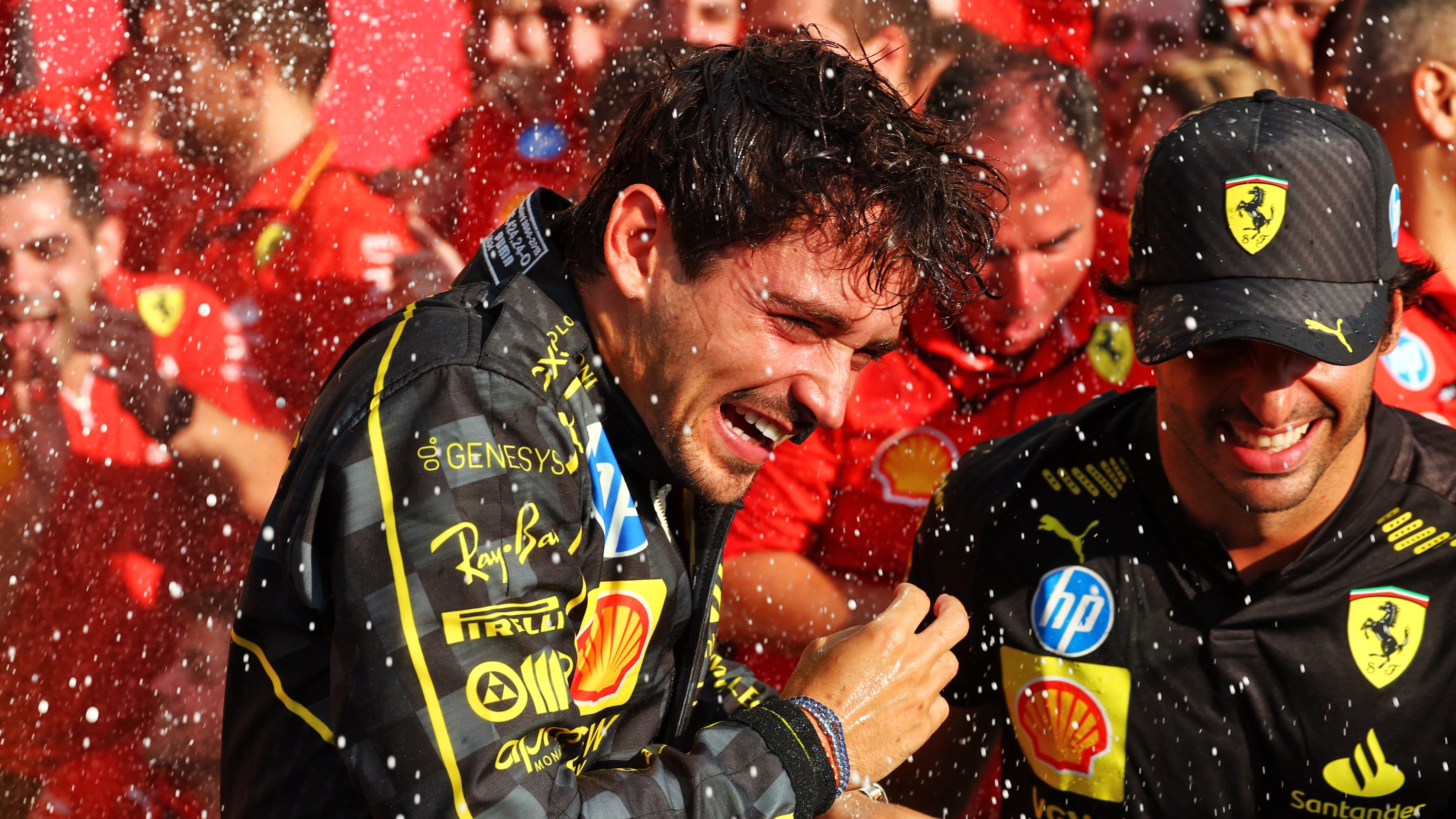 Photo of Charles Leclerc and Carlos Sainz celebrating Ferrari's win at the 2024 Italian Grand Prix