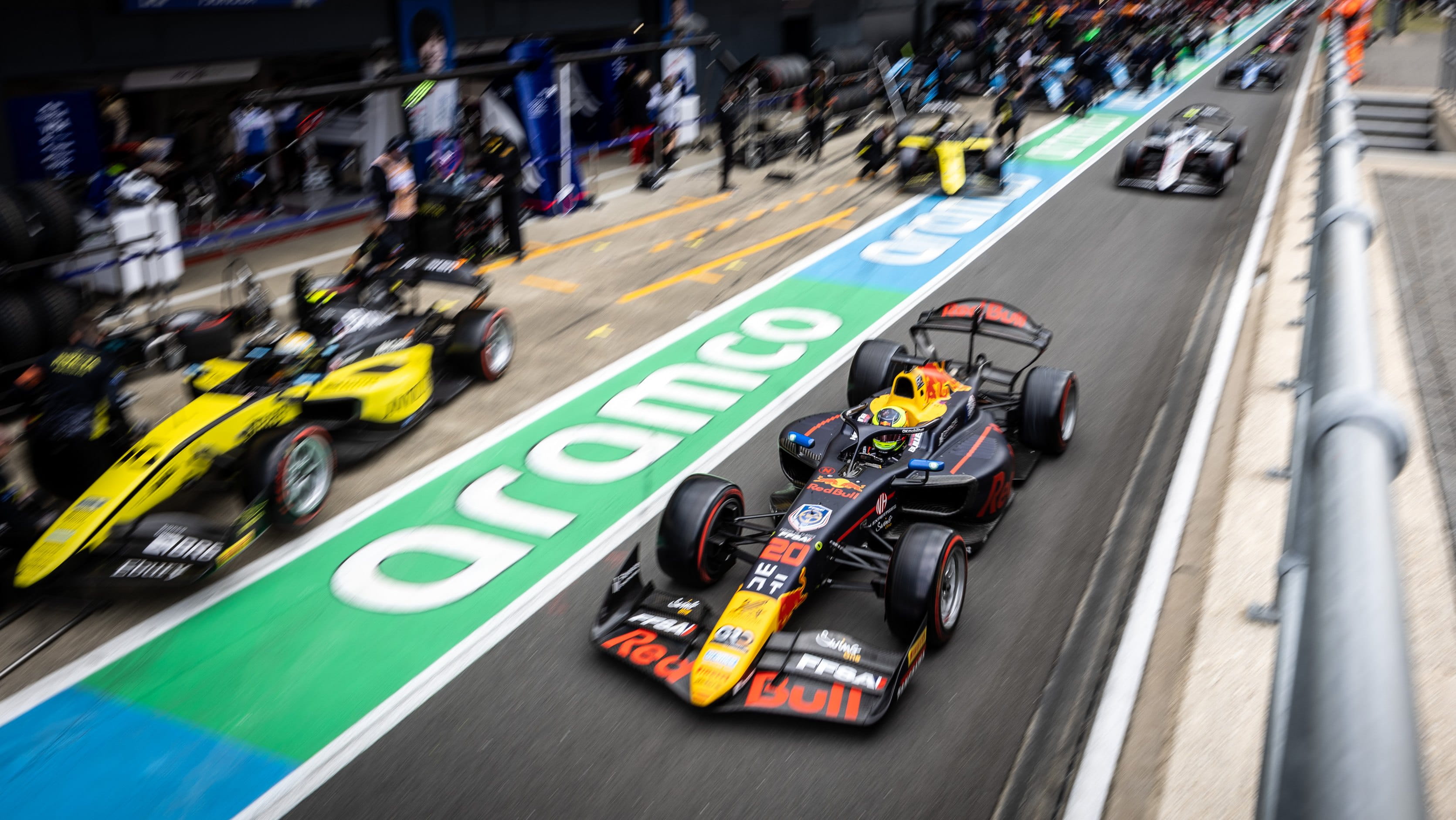 F2 car in pitlane with Aramco branding in background