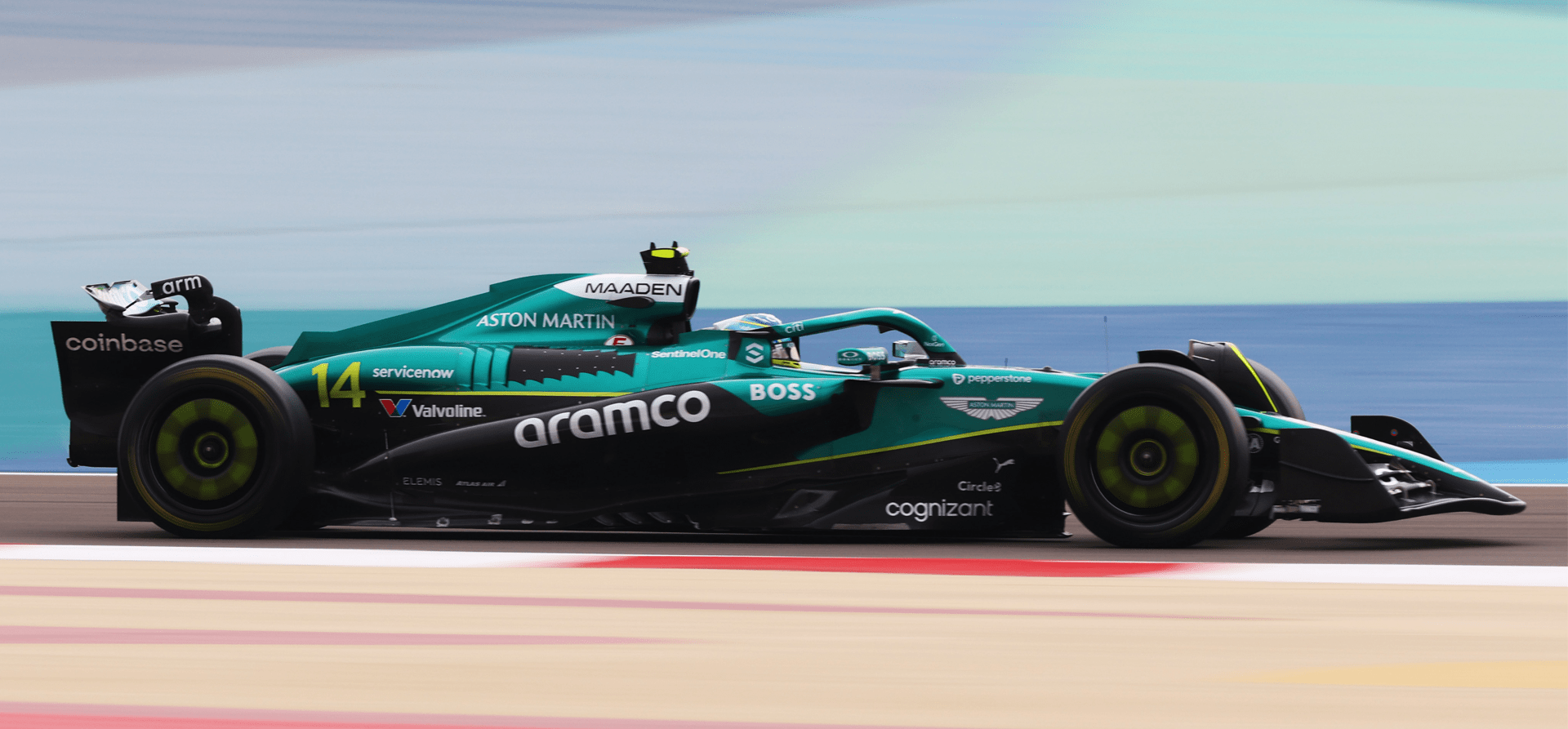 Sideways view of Aston Martin on track in Bahrain at F1 Testing 