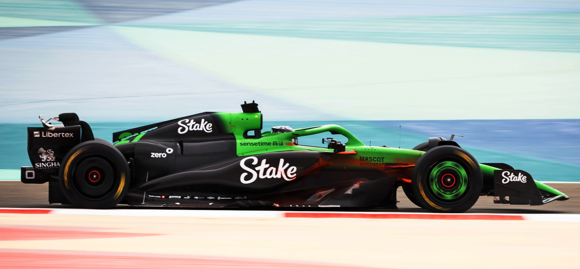 Sauber 2025 F1 car in green with red flow-vis paint visible on its front-right-hand-side