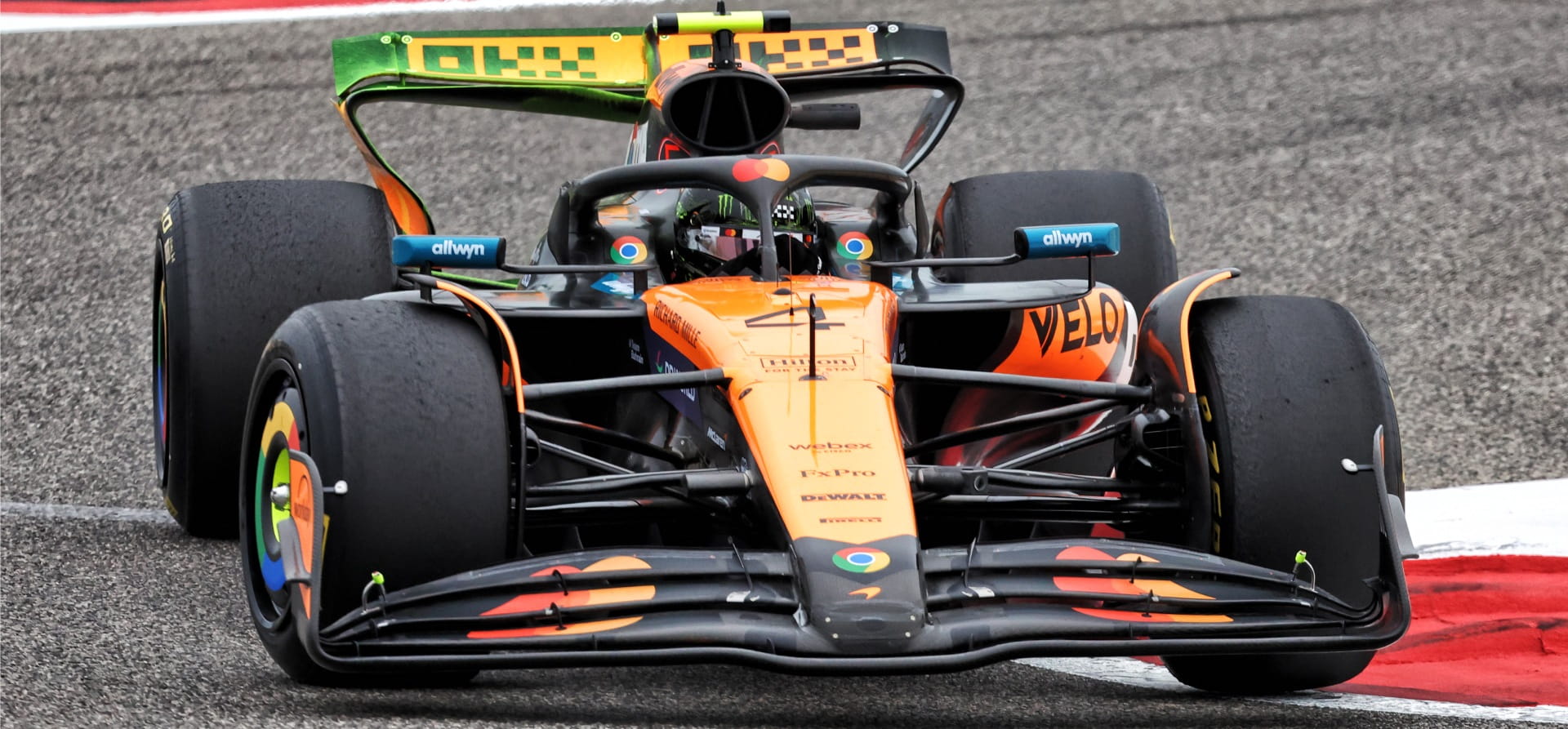 McLaren with flow vis paint on its rear wing during 2025 F1 preseason testing