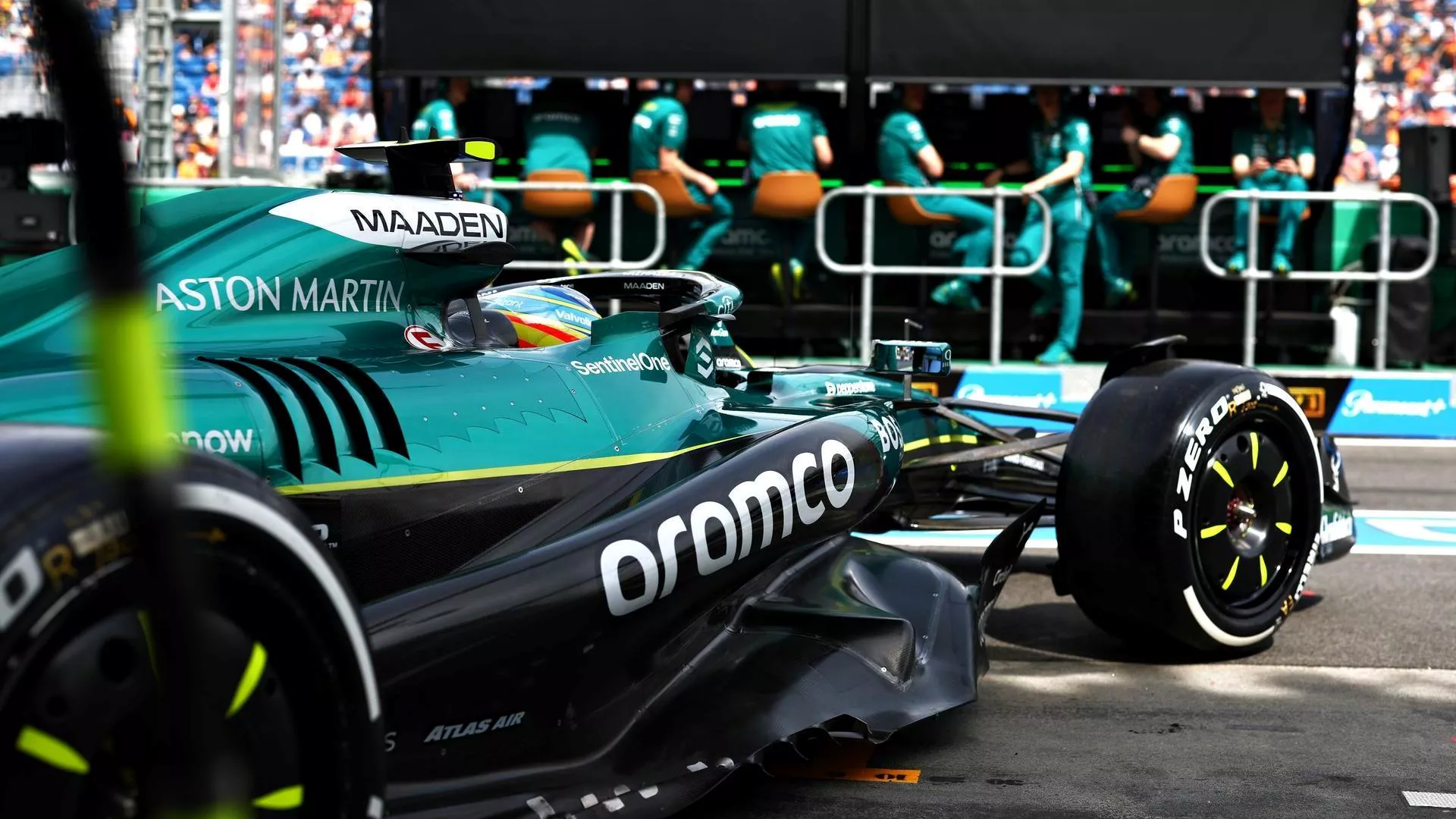 Aston Martin F1 car exiting garage