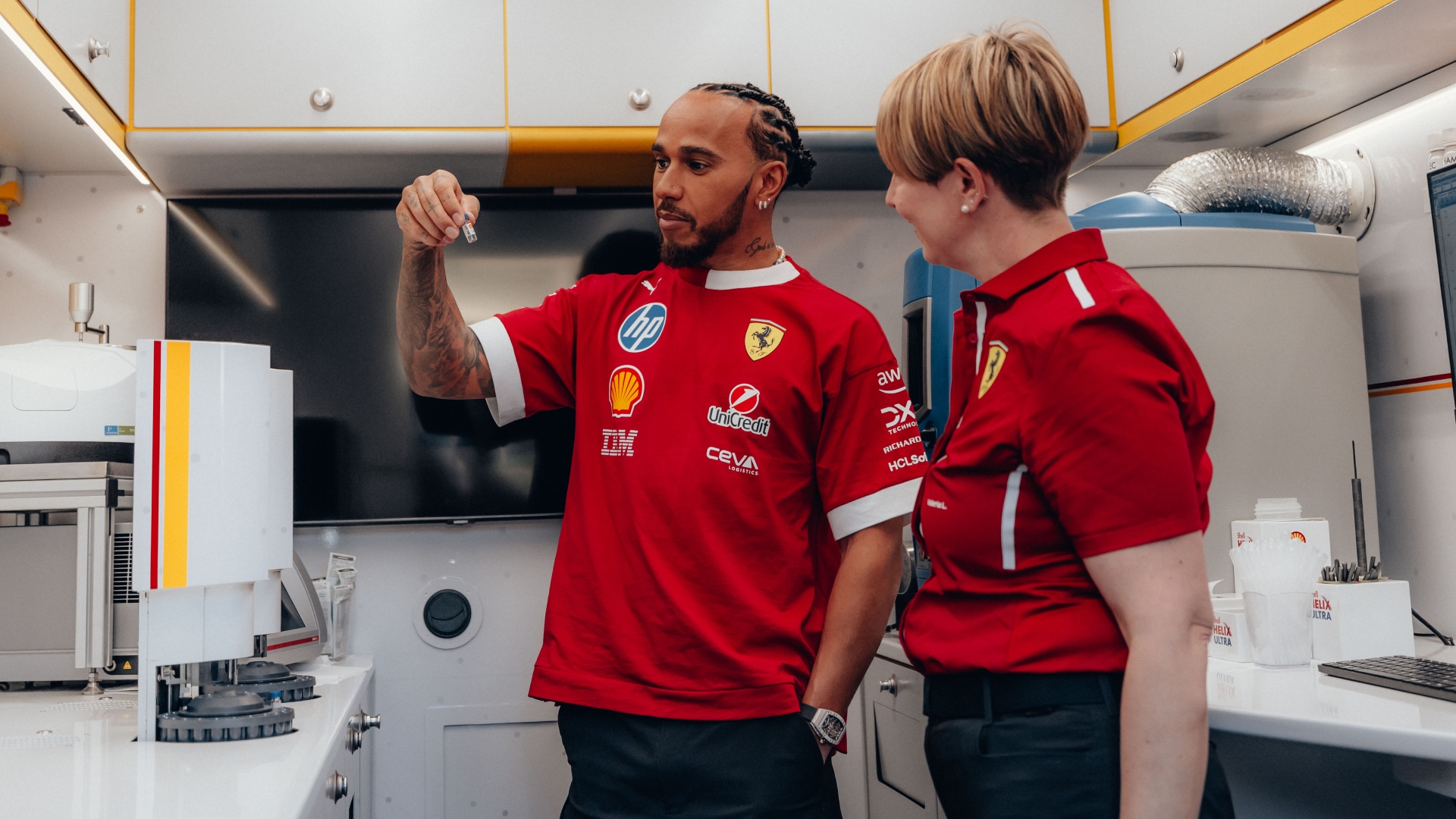 Lewis Hamilton and Charles Leclerc at Shell F1 trackside lab