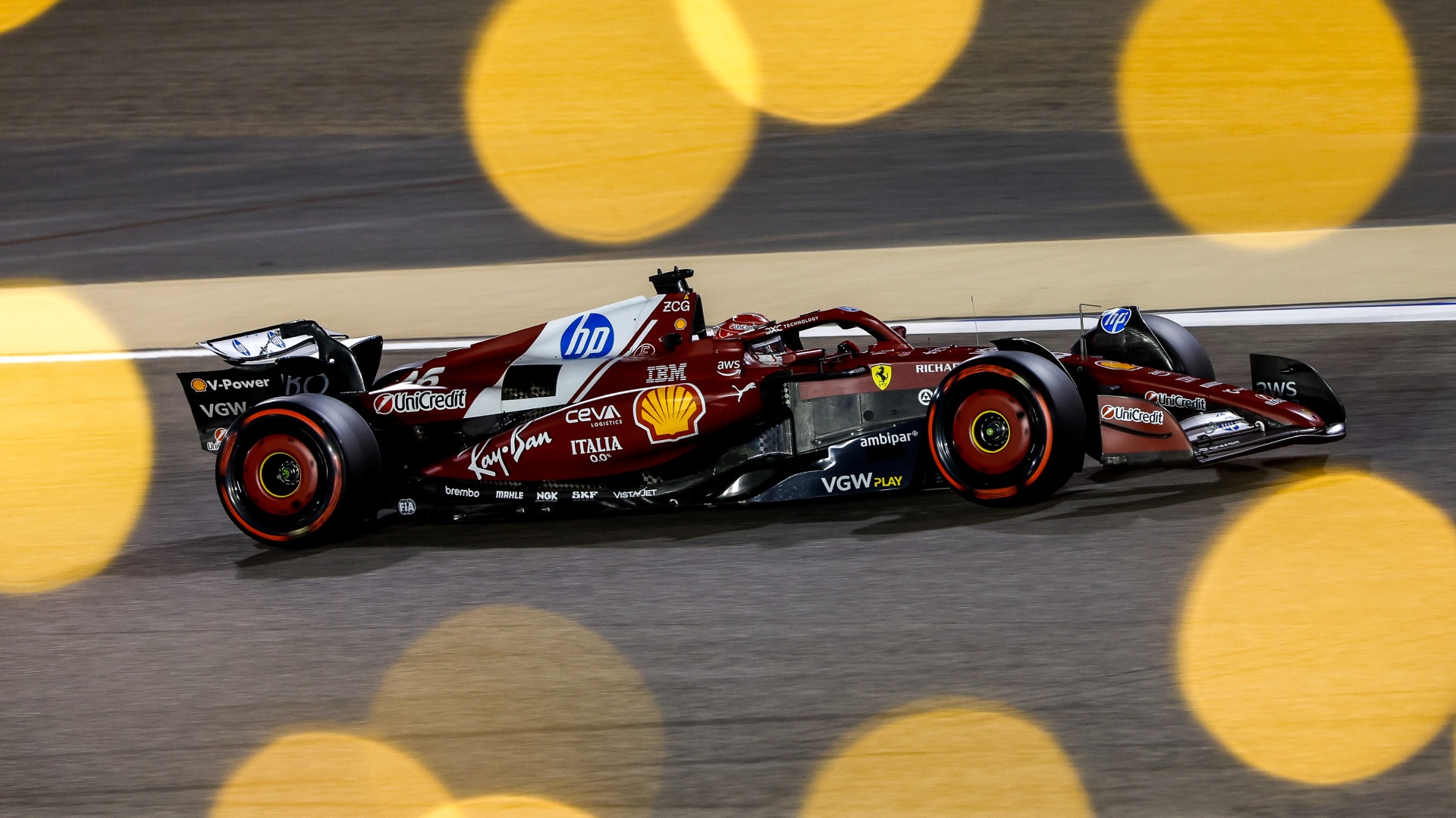 Ferrari with lens flare at 2025 Bahrain Grand Prix