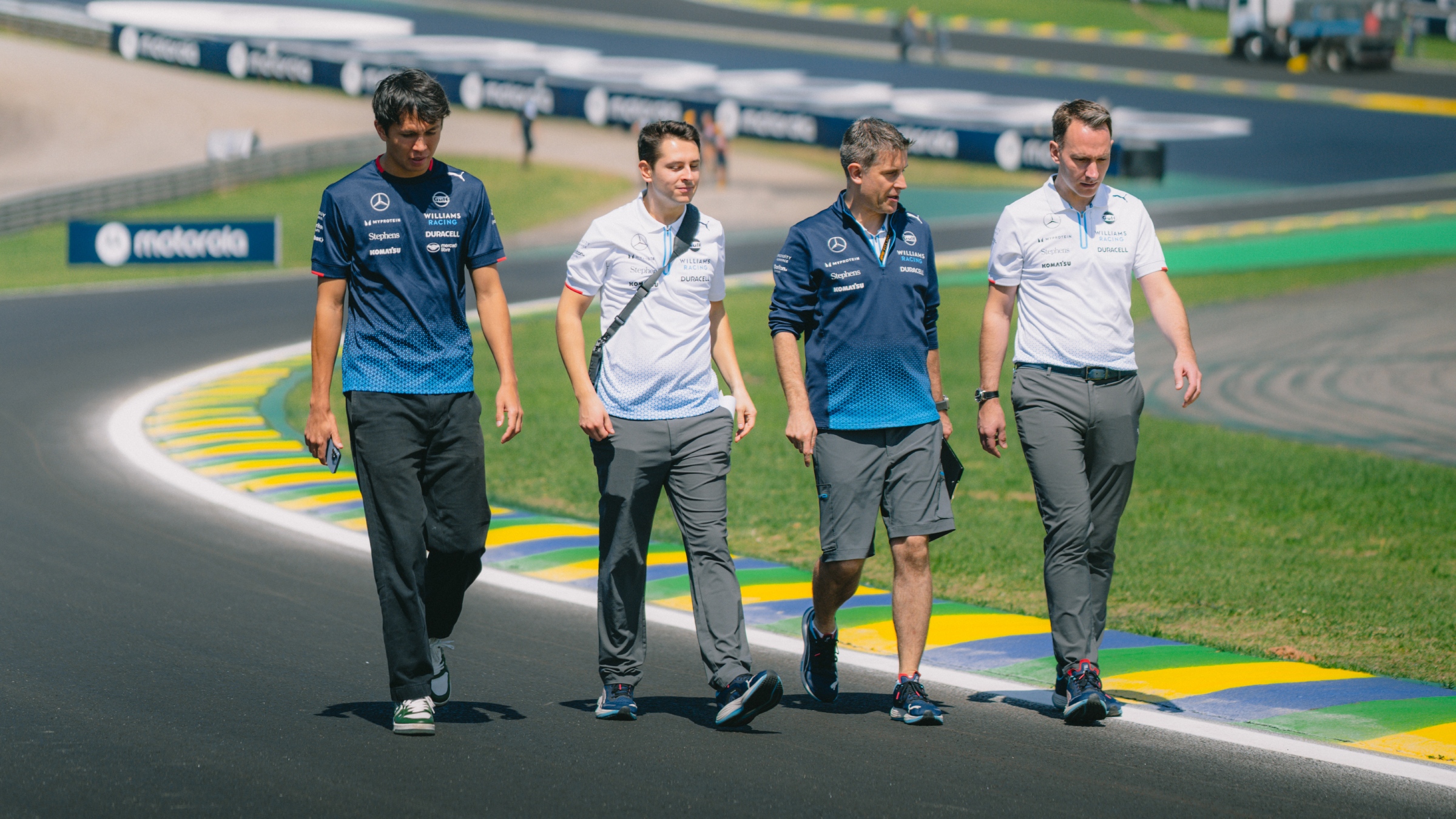 Williams drivers walking the track